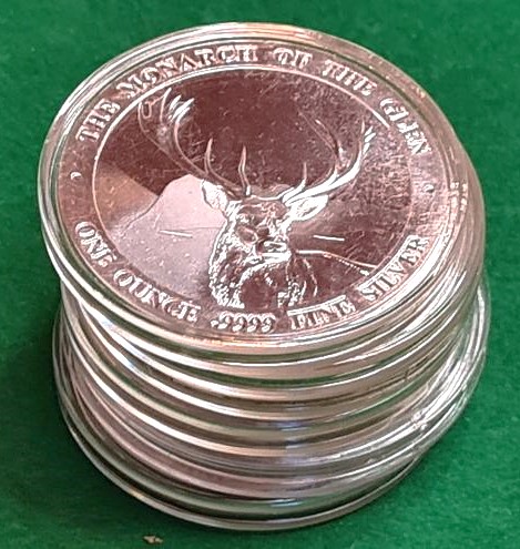Baird and Co. 1oz silver Rounds in a capsule